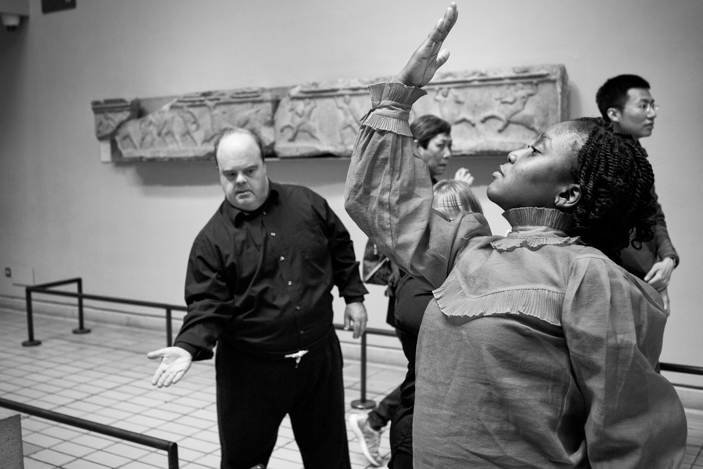 Black and white photo of Sheri dancing at the British Museum 